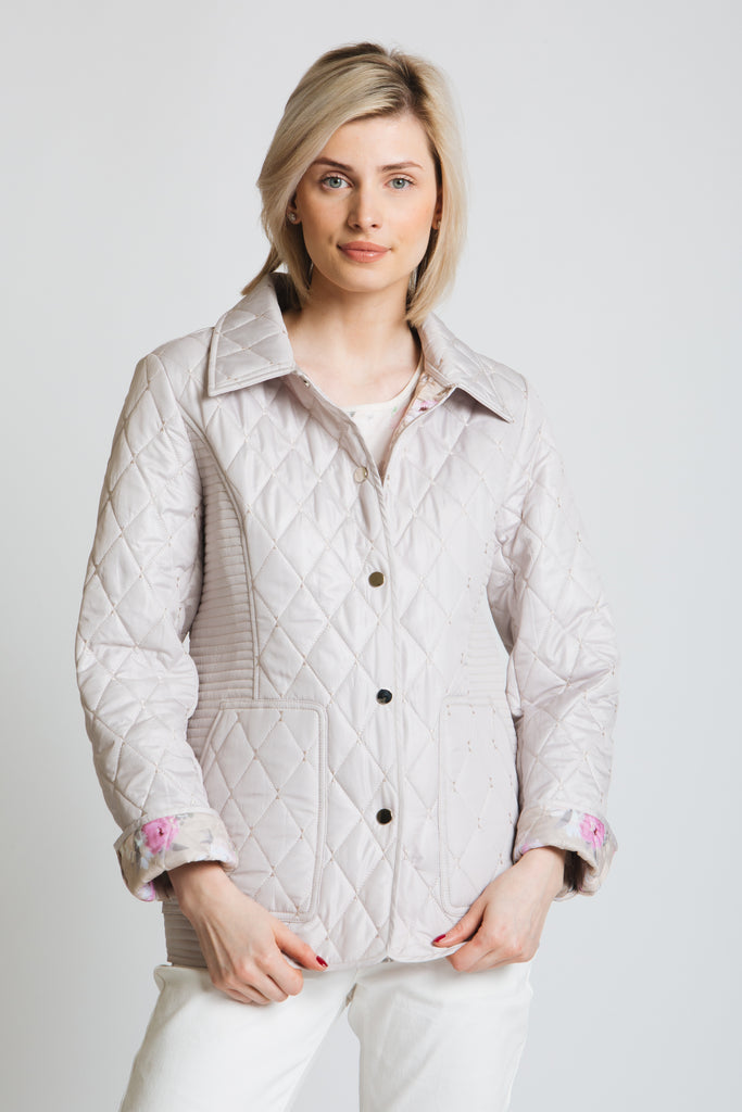 Our best selling classic diamond quilt  jacket in soft neutral stone. floral print lining to match. Standard fit.