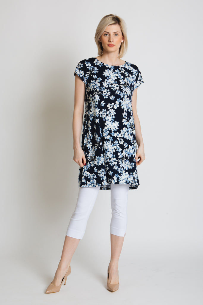 Navy printed tunic in jersey crepe. Drop shoulder with gold button detail.