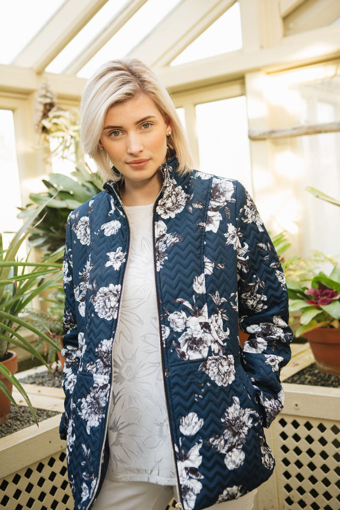 Embossed zig-zag quilt jacket in one of our new summer print, navy base with white floral. A very chic look